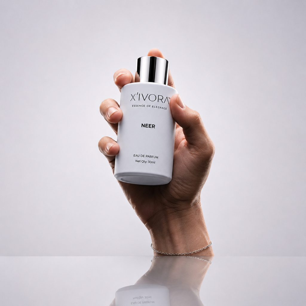 Hand holding XIVORA NEER Eau De Parfum bottle
