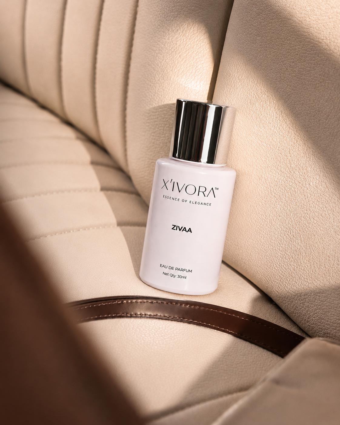 XIVORA ZIVAA perfume bottle in luxury car interior